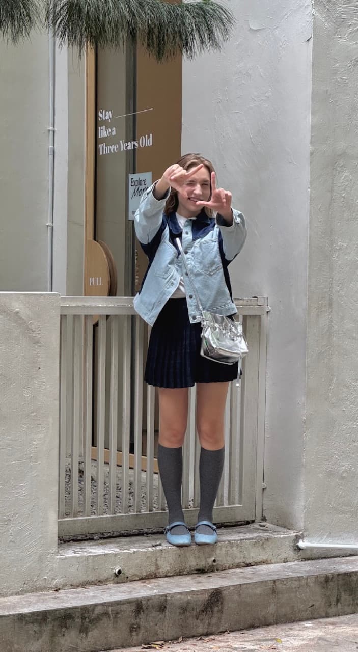 Standing by a white railing